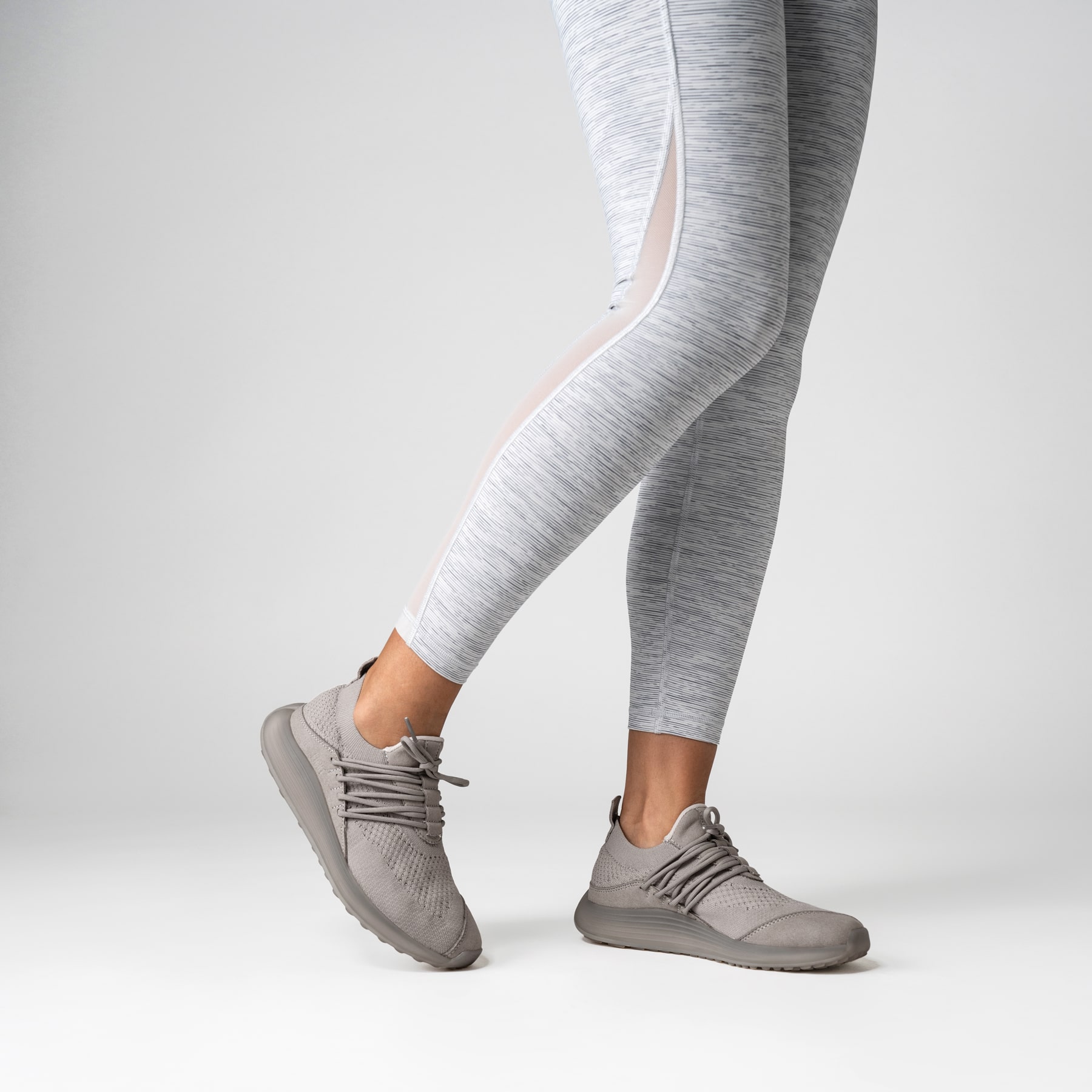 LANEEIGHT-TRAINER-AD-1-LunarGrey-WomensOnFoot-min