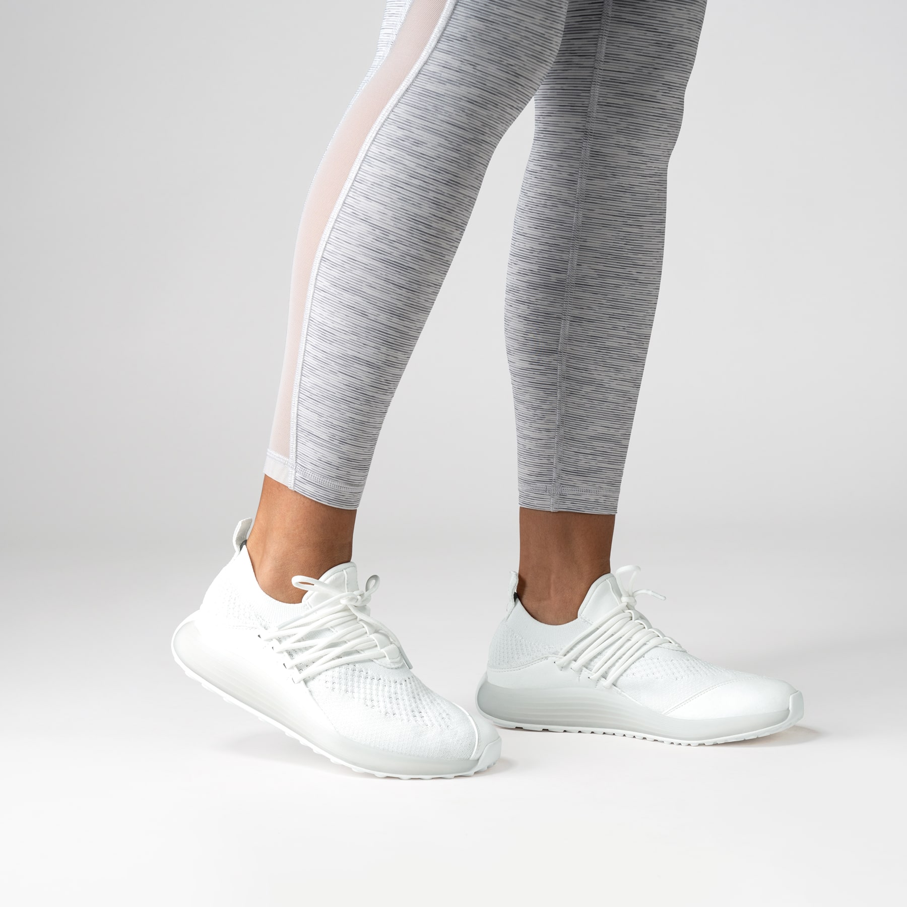 LANEEIGHT-TRAINER-AD-1-CloudWhite-WomensOnFoot-min
