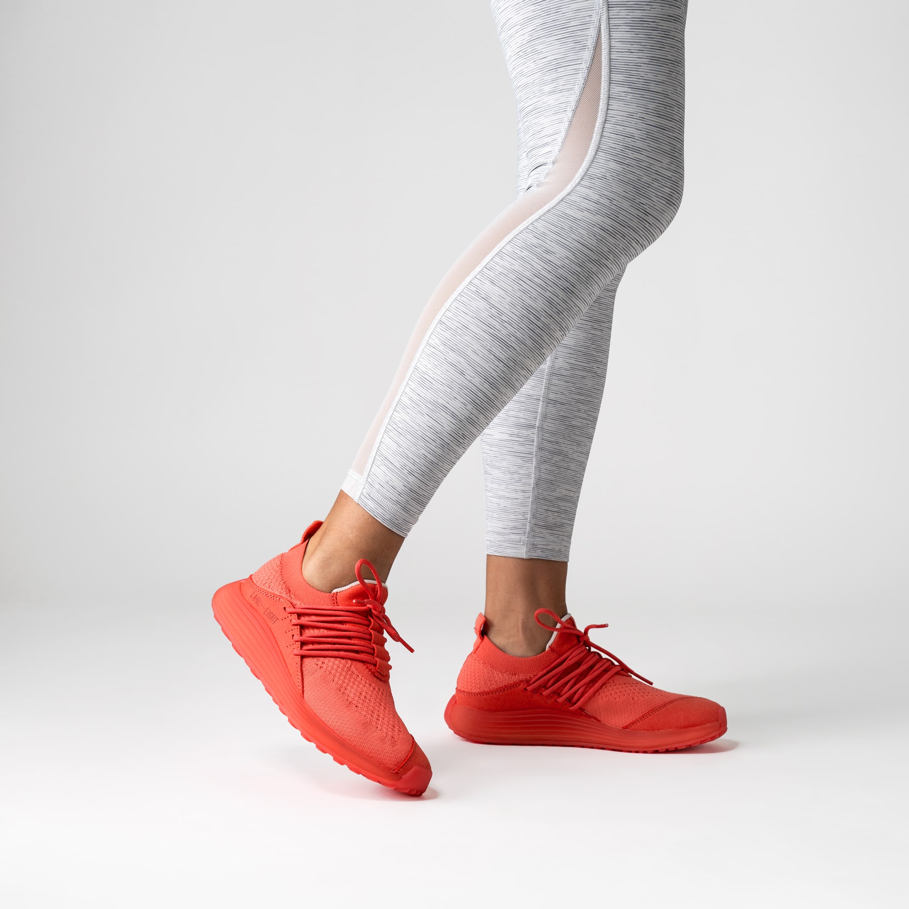 LANEEIGHT-TRAINER-AD-1-EarthRed-WomensOnFoot-min