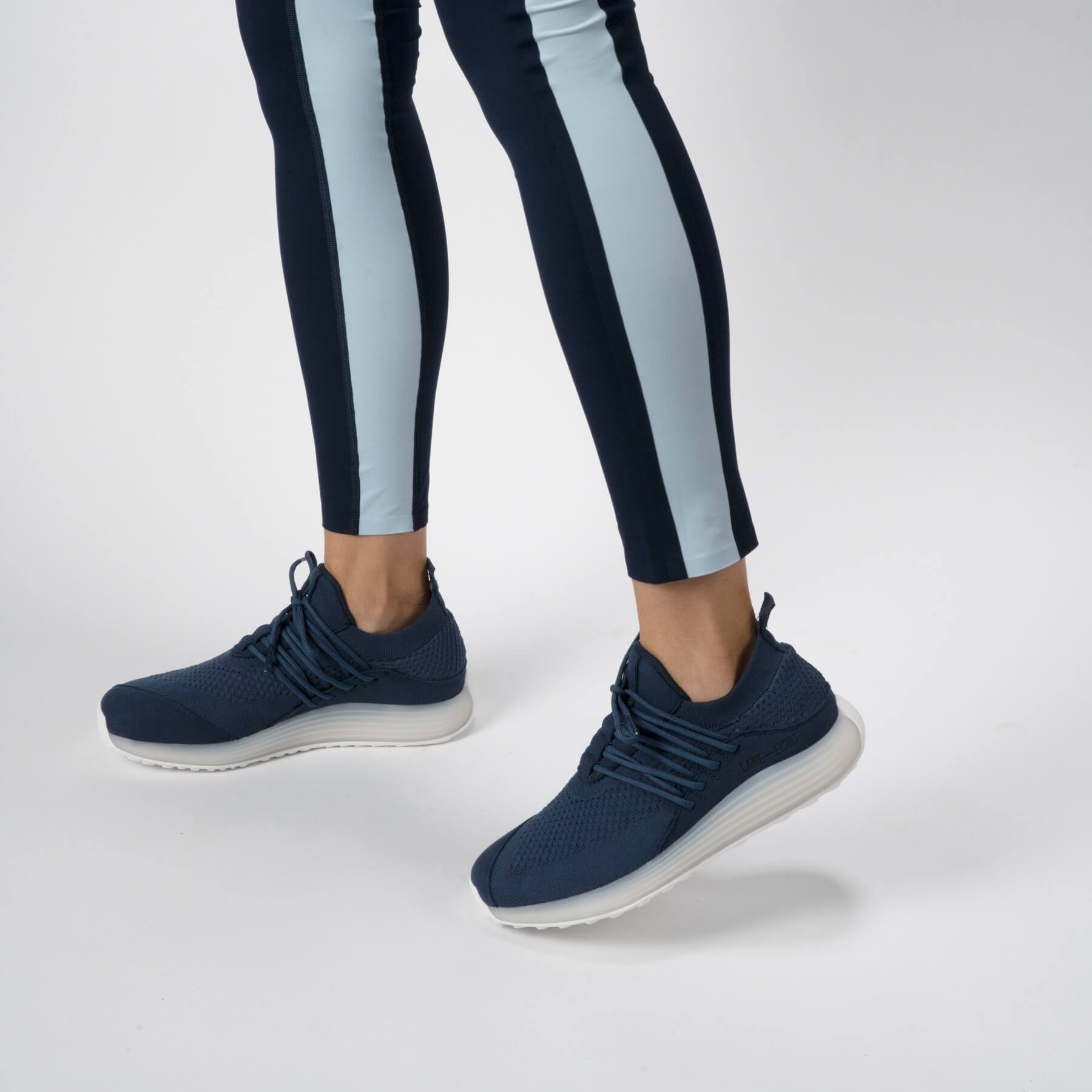 LANEEIGHT-TRAINER-AD-1-DeepBlue-WomensOnFoot