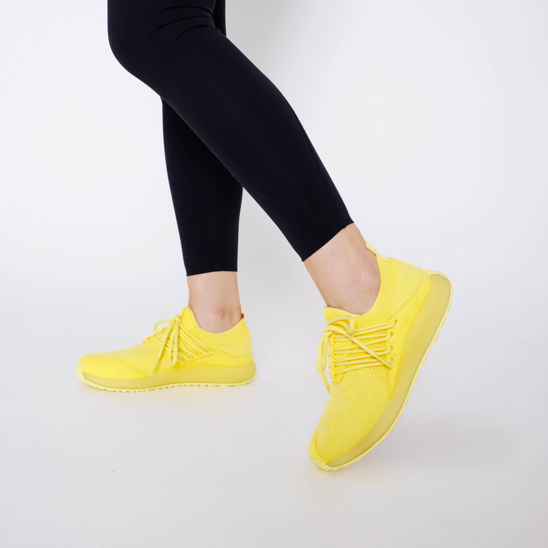 LANEEIGHT-TRAINER-AD-1-SunriseYellow-WomensOnFoot