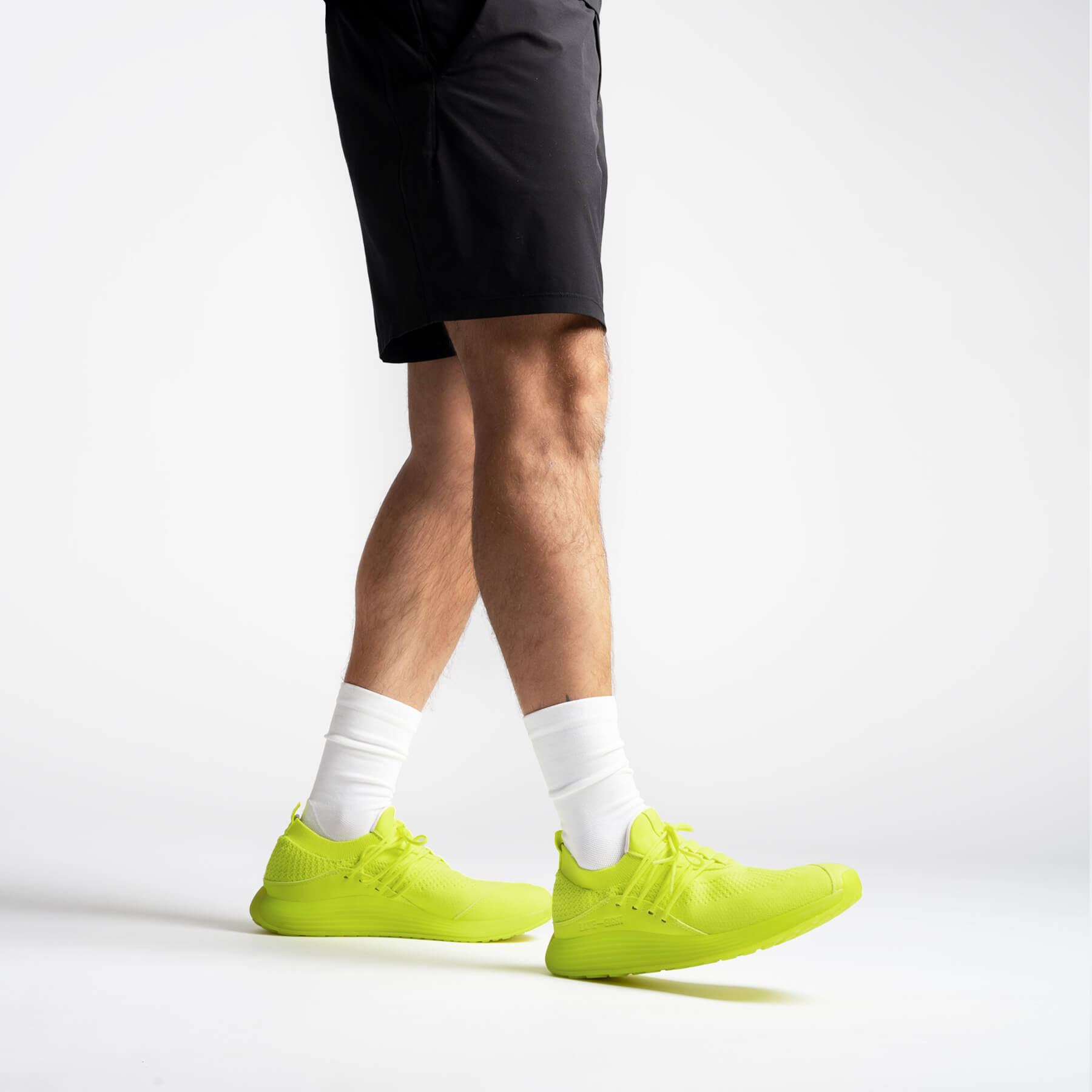 LANEEIGHT-TRAINER-AD-1-ElectricYellow-MensOnFoot