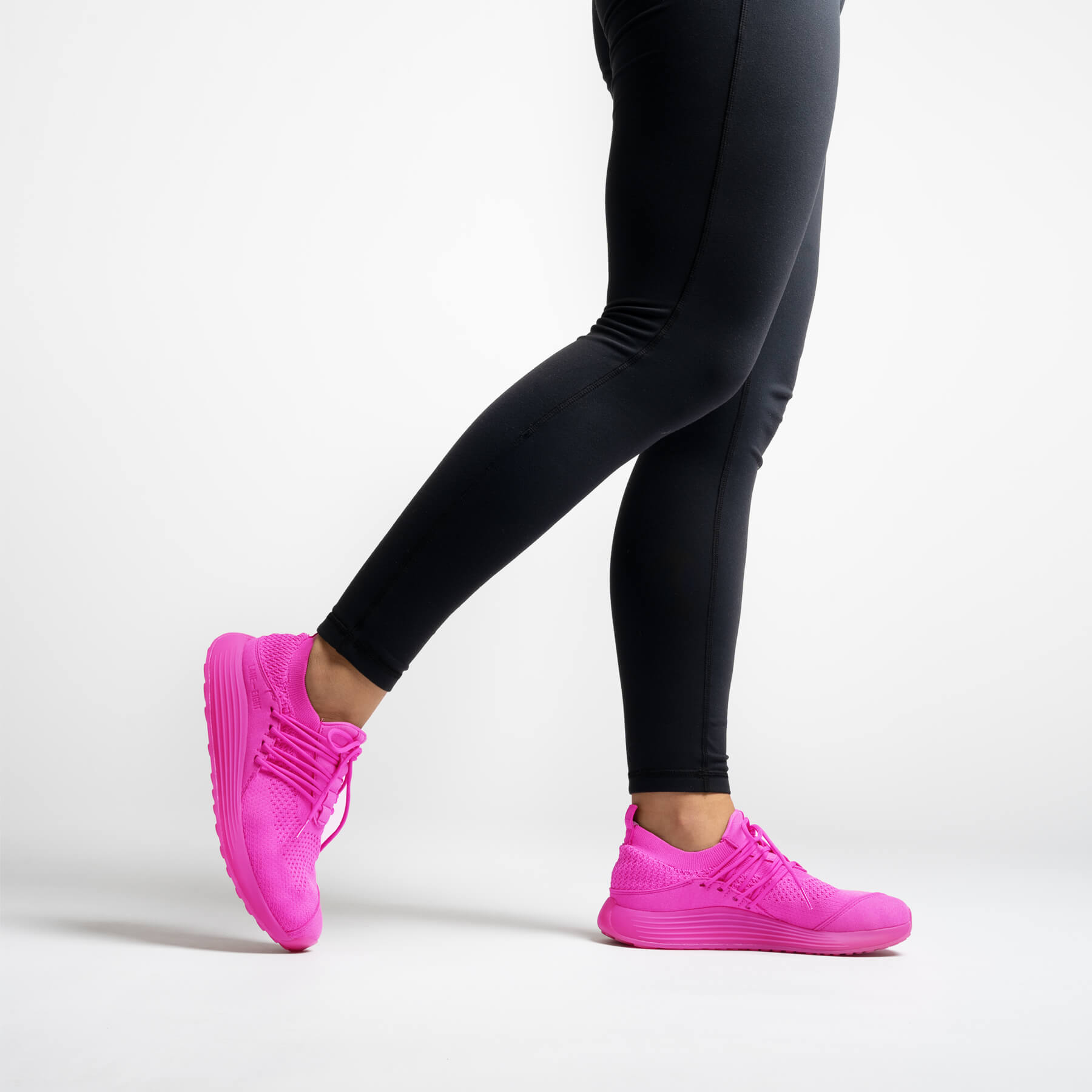 LANEEIGHT-TRAINER-AD-1-HyperPink-WomensOnFoot